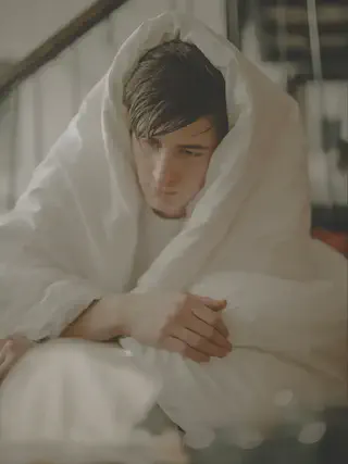 Person Hiding in Blanket
