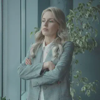 Woman in Gray Blazer